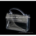Clear crystal PVC trousse with handle and snap button
